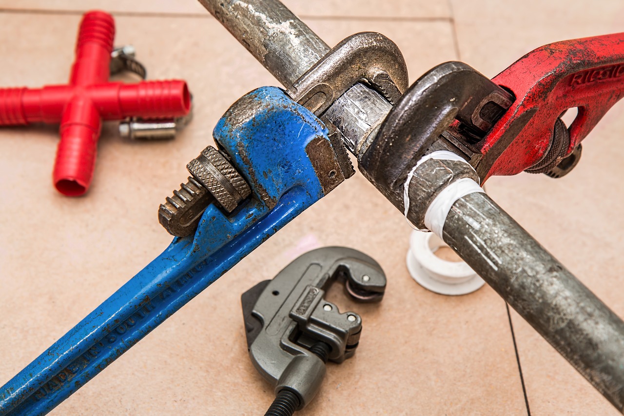 two pipe wrenches